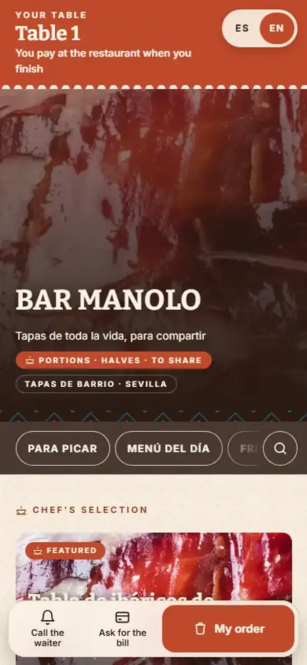 La carta de Bar Manolo en inglés desde la mesa 1, con el selector ES y EN arriba y los botones para llamar al camarero y pedir la cuenta